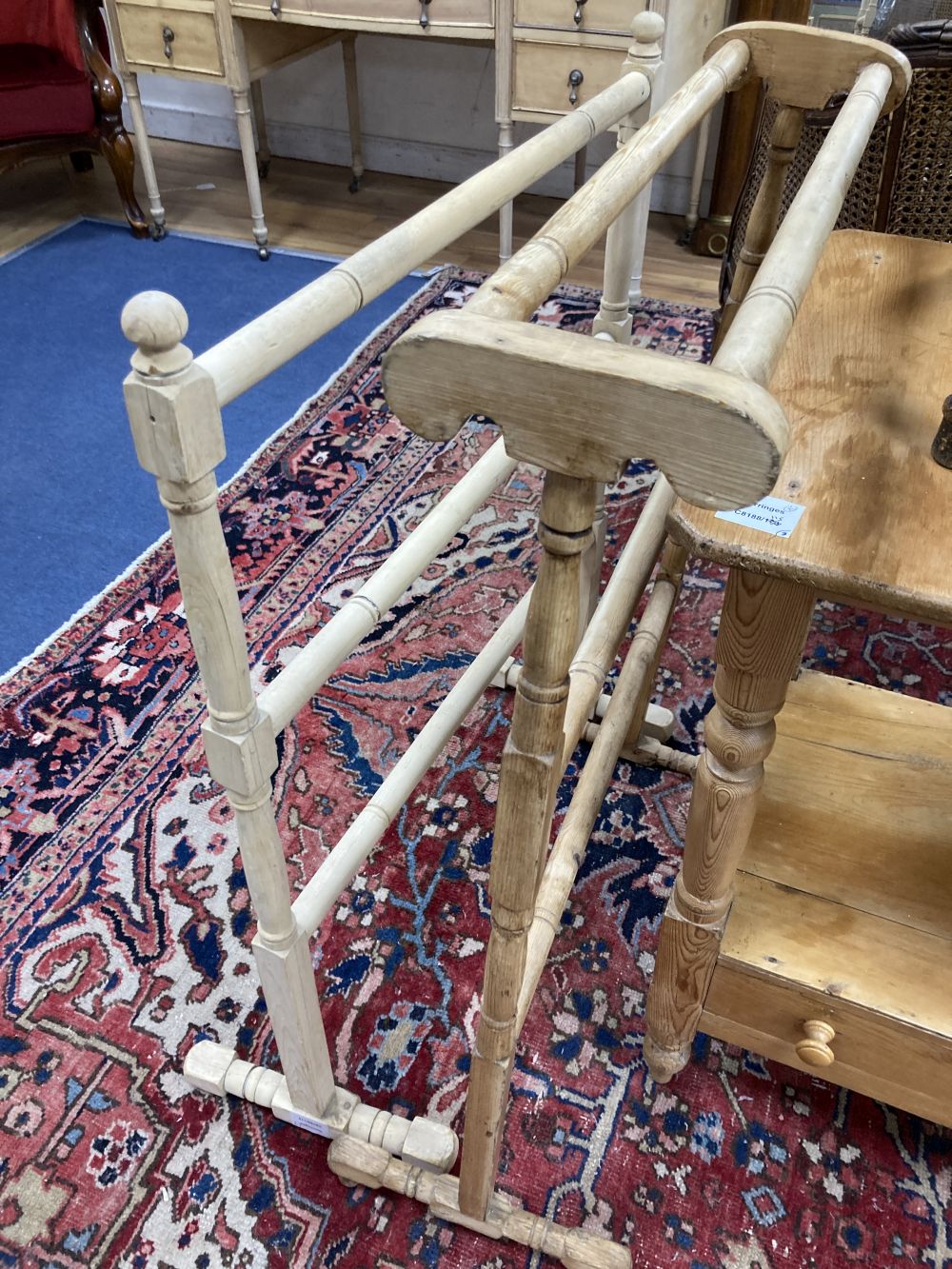A Victorian pine two tier washstand, width 62cm, two towel rails and a provincial stool